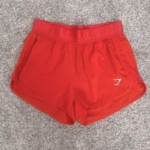 NWOT gymshark running shorts size small orange